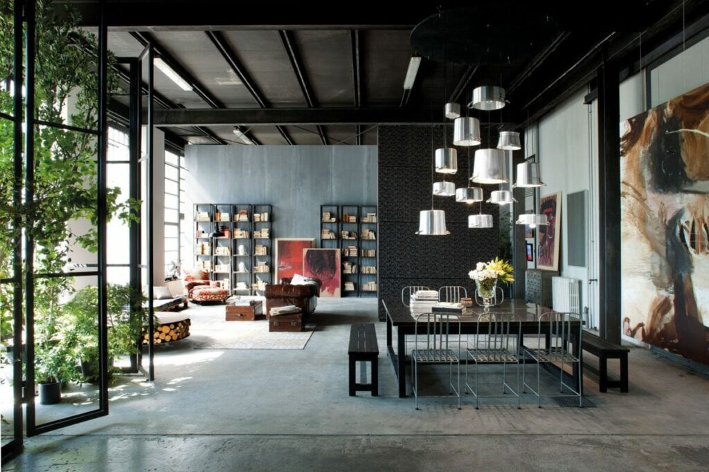 Large Open Concept Interior Filled With Industrial Decor And Wall Decor Homedit